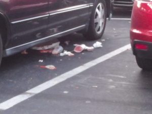 Trash From Cars In Parking Lot 